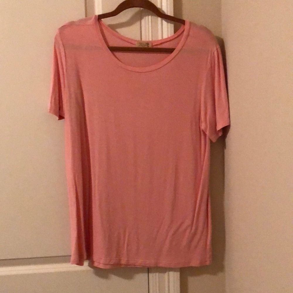 Small short sleeve pink piko top